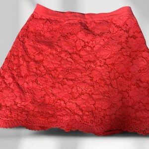 Bebe Mini Skirt with Flower Lace